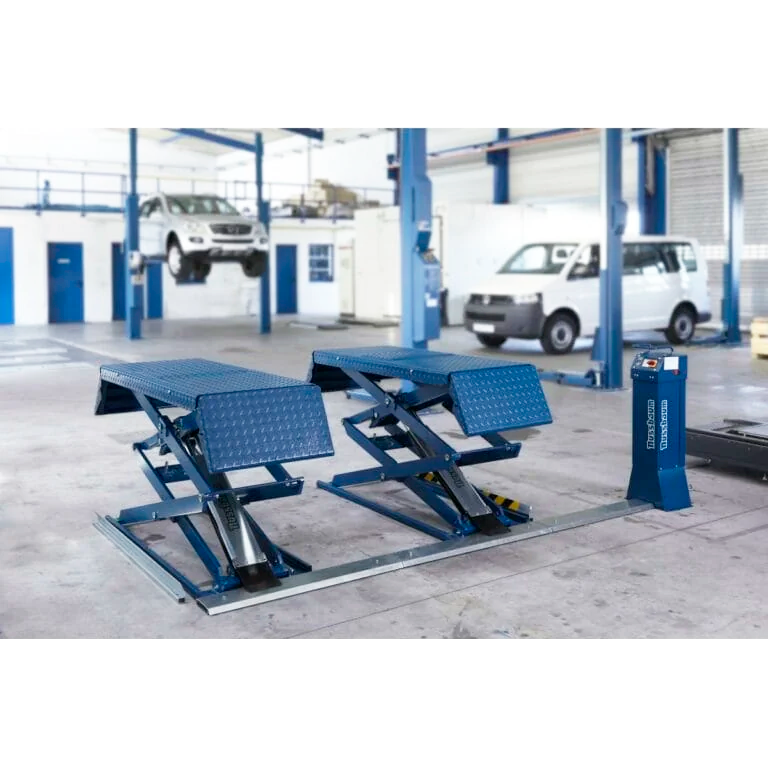 korjaamolle sijoitettu Nussbaum Jumbo Lift saksinostin